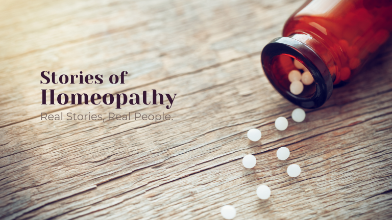 Stories of Homeopathy in text, a small vial with homeopathy pellets spilled out on the table